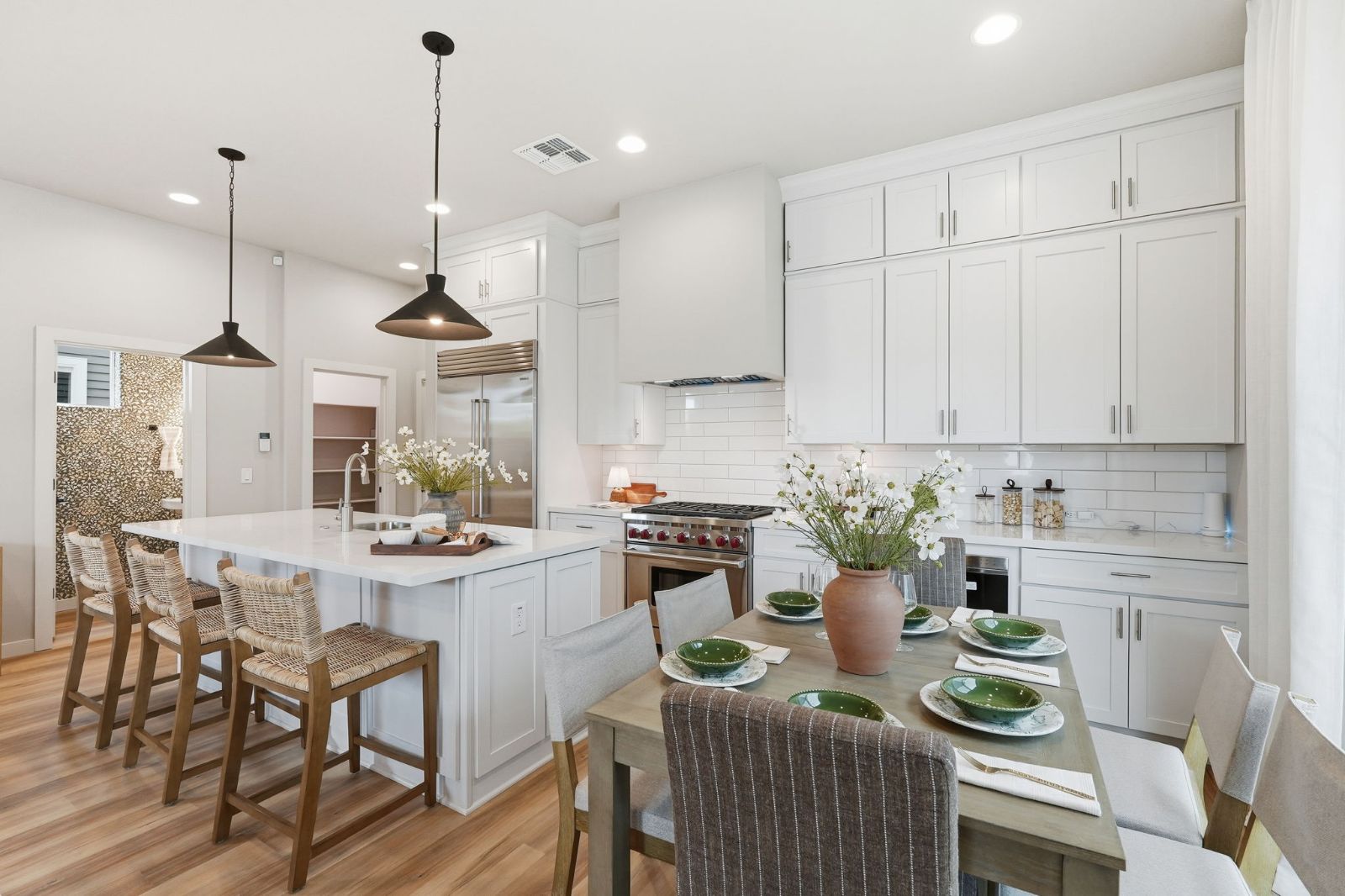Kitchen with island seating, AZT ceramic tile backsplash and antique brass hardware — Heritage Home model at 113 W Willo Ct, The Bower Willo, Willo Historic District, Phoenix AZ 85003