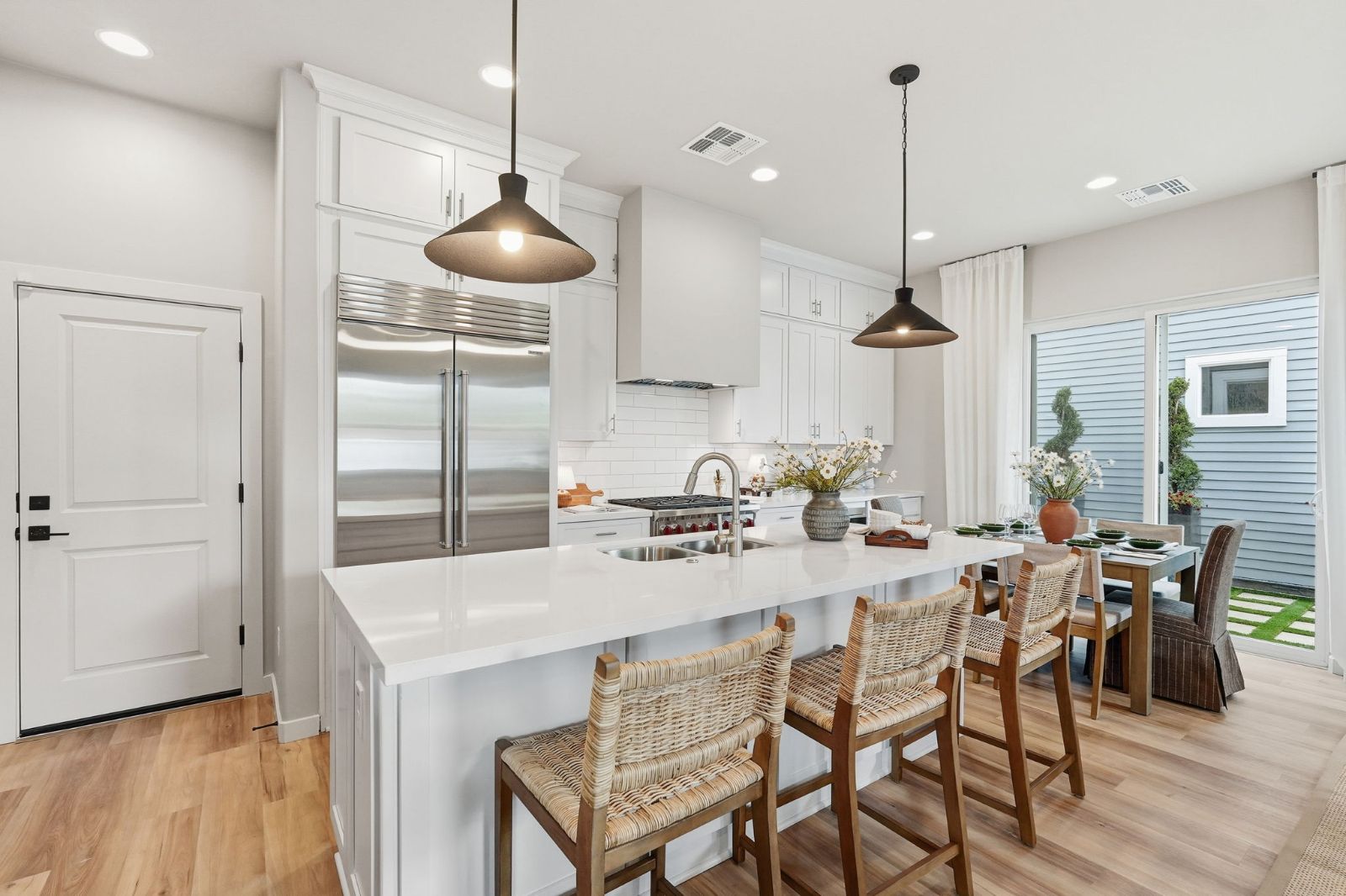 Quartz kitchen island with pendant lighting — Heritage Home model at 113 W Willo Ct, The Bower Willo, Willo Historic District, Phoenix AZ 85003