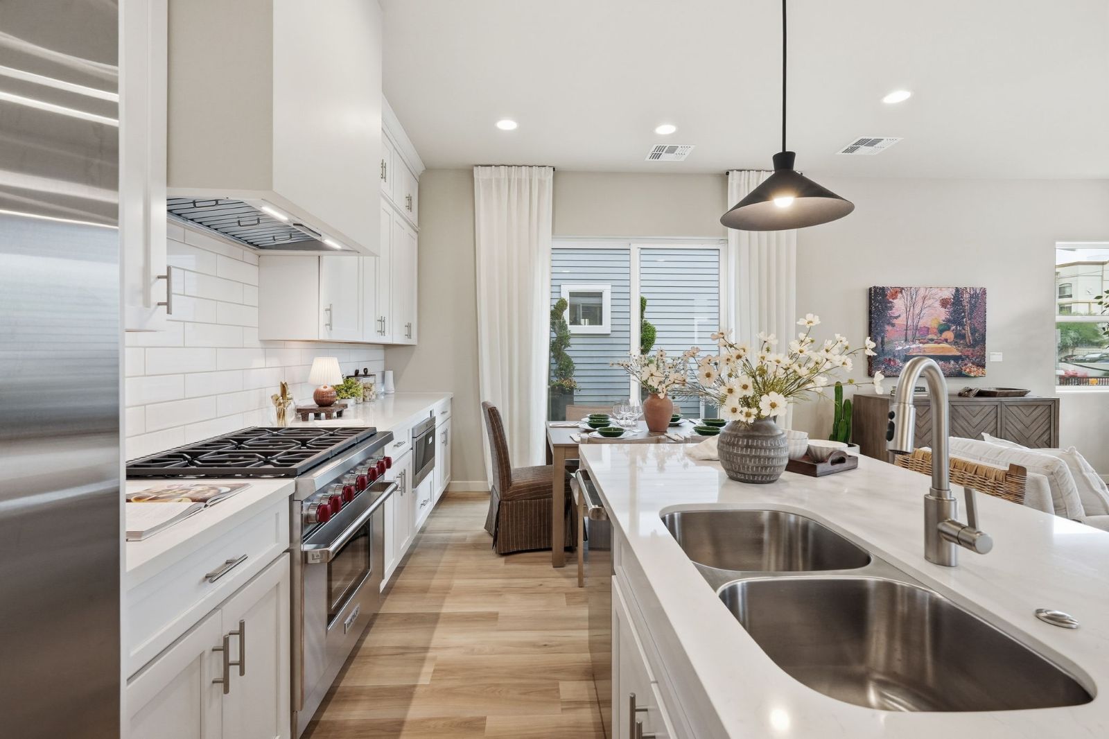 Kitchen detail: full-overlay cabinetry and Wolf appliances, standard specification — Heritage Home model at 113 W Willo Ct, The Bower Willo, Willo Historic District, Phoenix AZ 85003